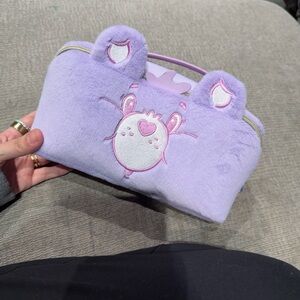 Impressions Purple Plush Bag with carebear design